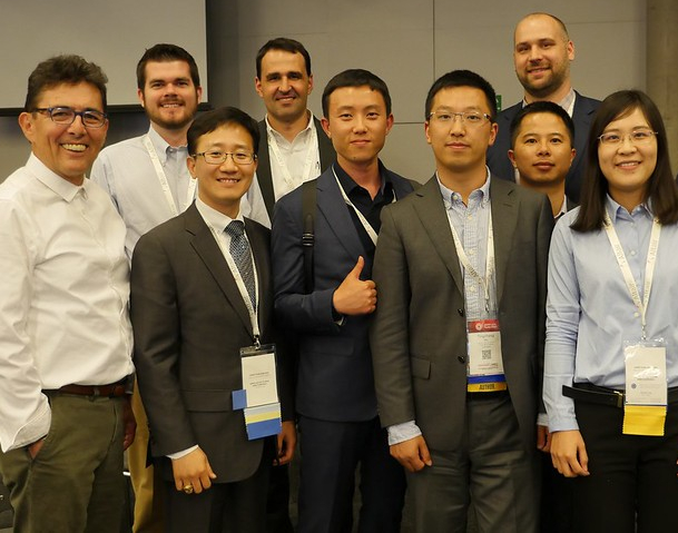 Group photo of students and professors at ASME meeting